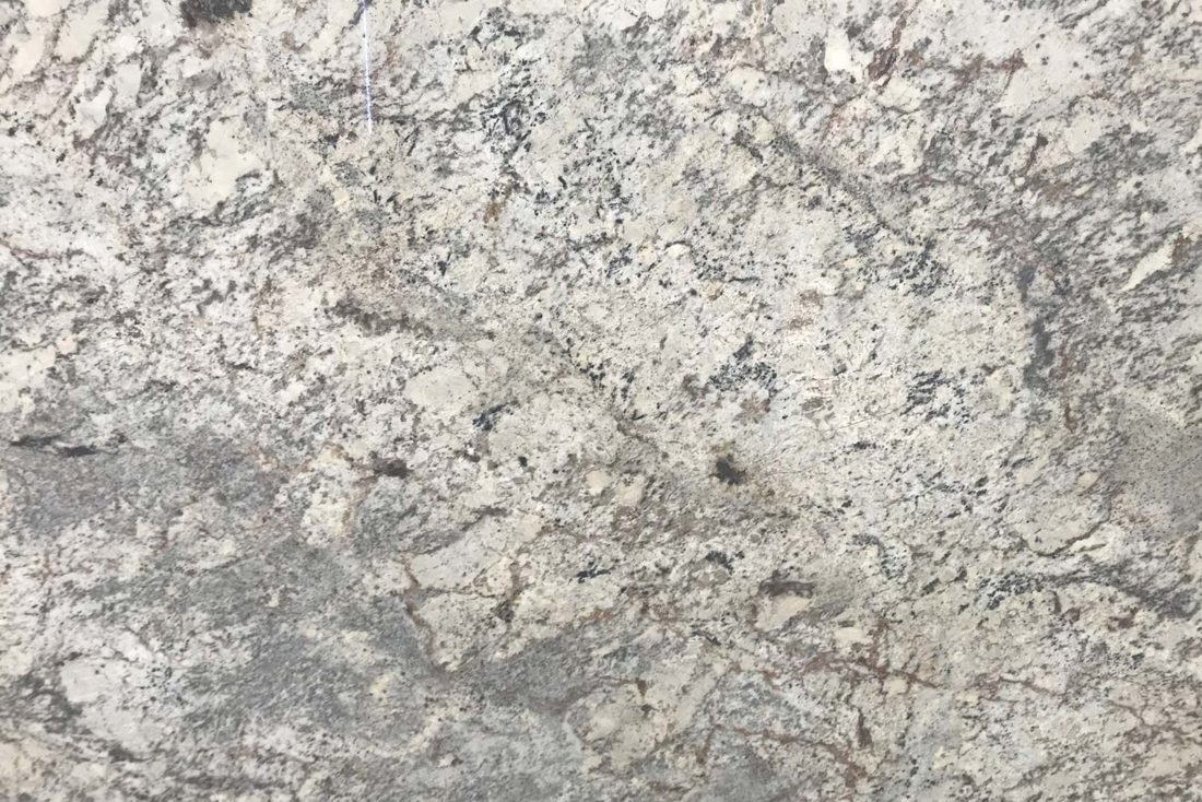Typhoon Bordeaux Typhoon Bordeaux granite, slab close-up (representative)